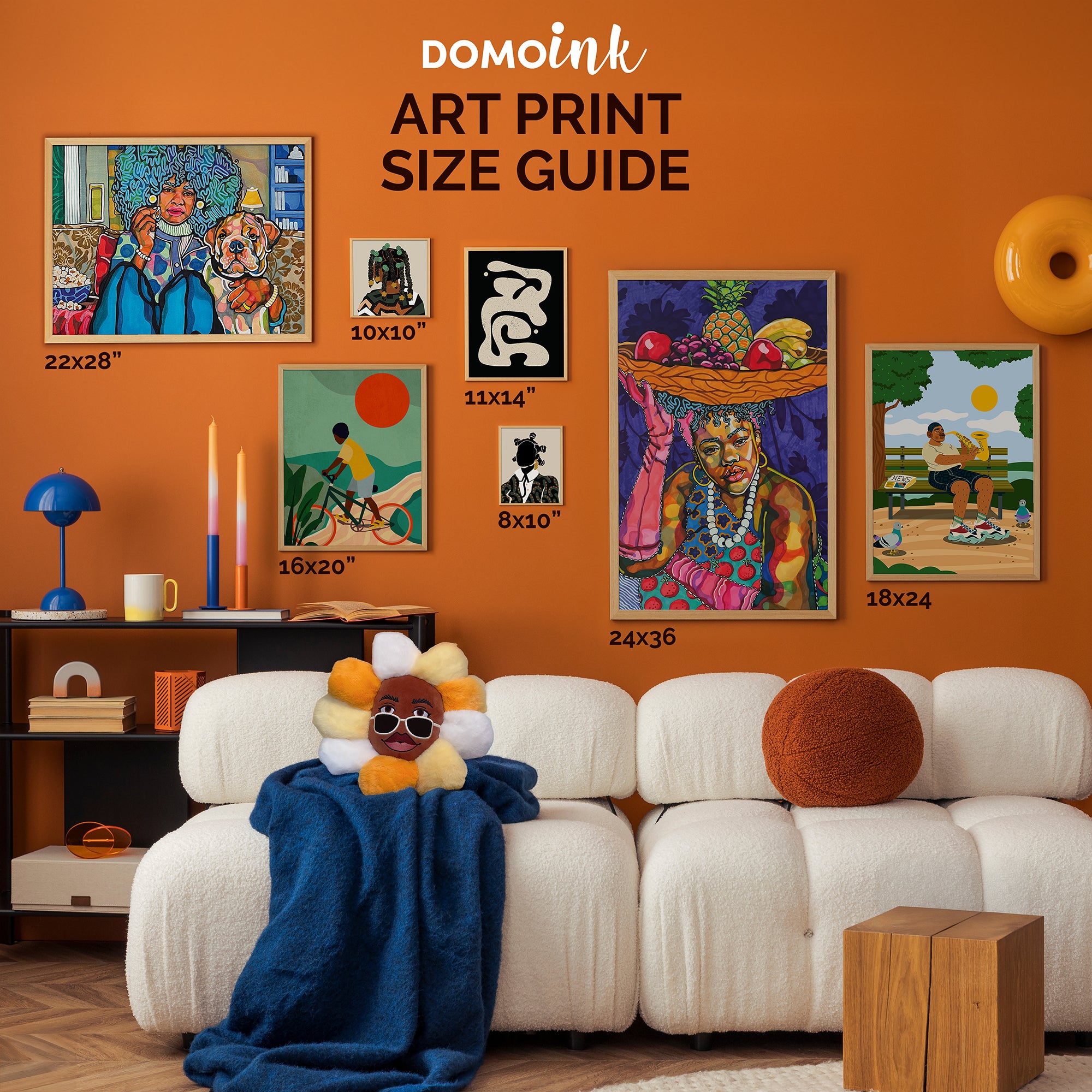 a living room with orange walls and a white couch
