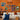 a living room with orange walls and a white couch